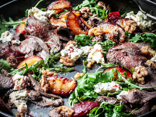 Blackened Spiced Wild Venison with Roast Plum, Blue Cheese Salad