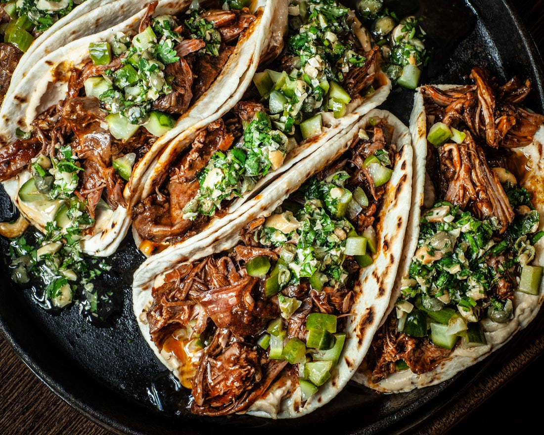 Slow Roasted Goat Tacos with Nutty Hummus & Salsa Verde