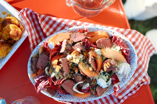 Chargrilled wild venison backstrap on a quince, radicchio and goat's curd salad